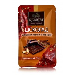 Шоколад Kedrini молочный с кедровым орехом и корицей, 23 г